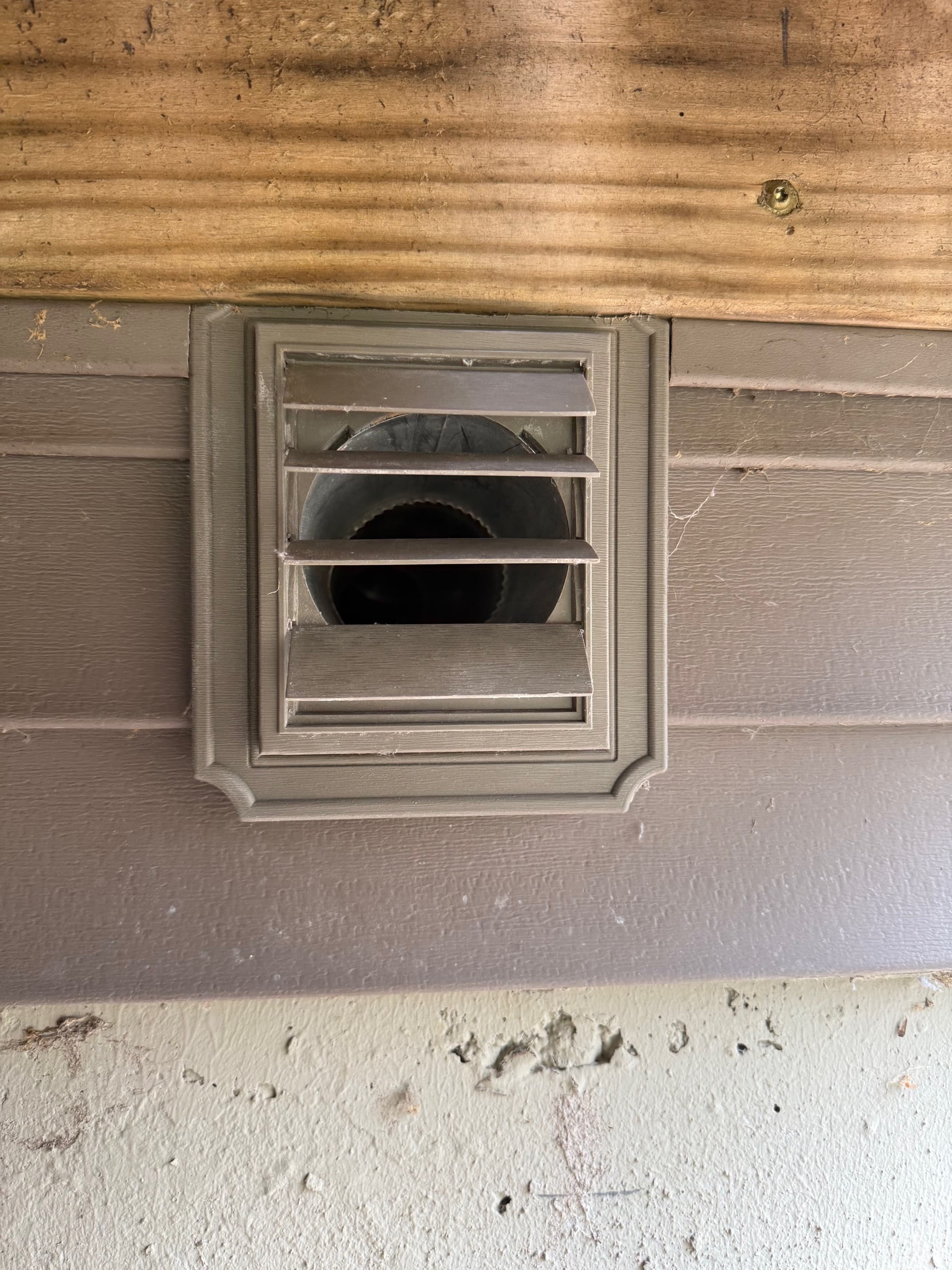 Dryer vent after cleaning with lint and debris removed