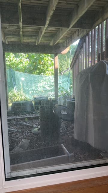 Window before cleaning with visible haze